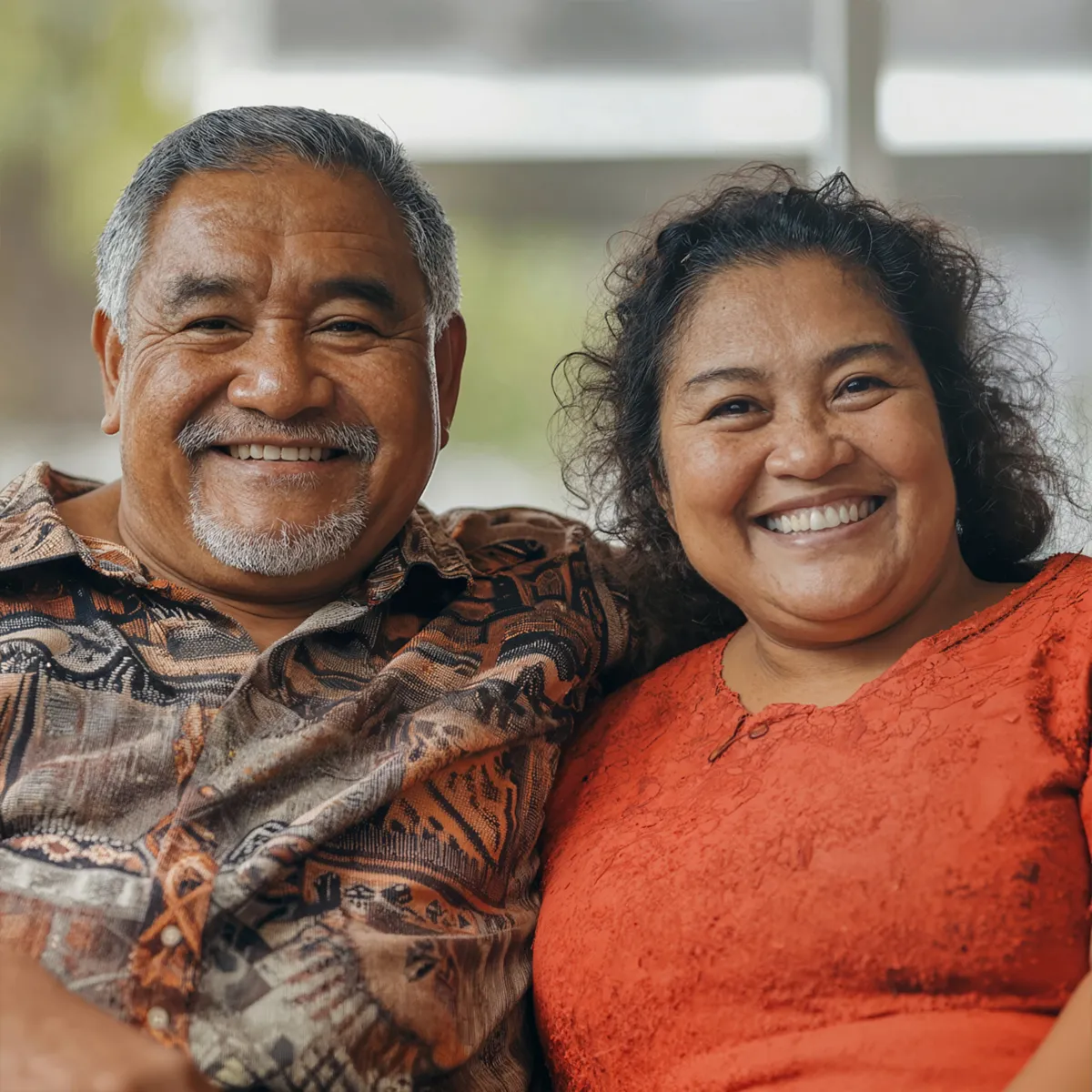 Square_3 - Pacific Finance Middle age pacific island couple smiling at the camera who live in avondale auckland